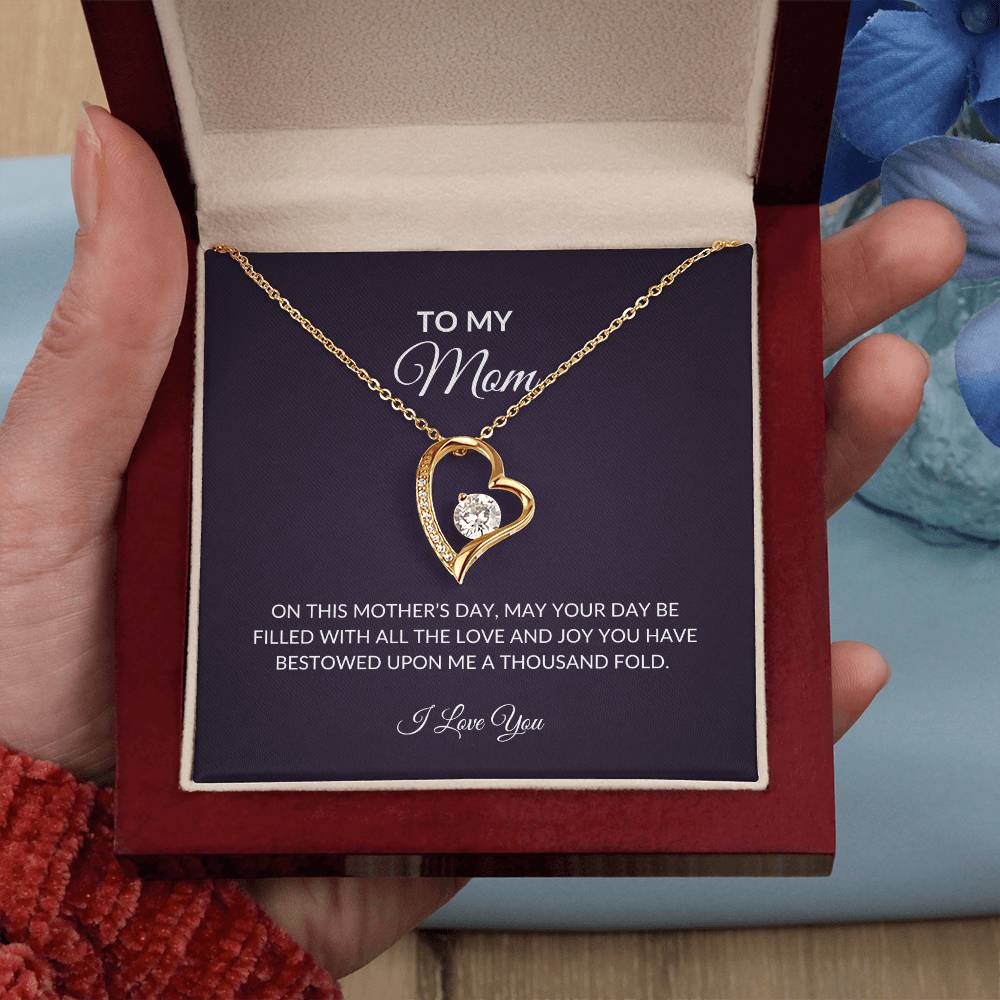 gold necklace with message in luxury box