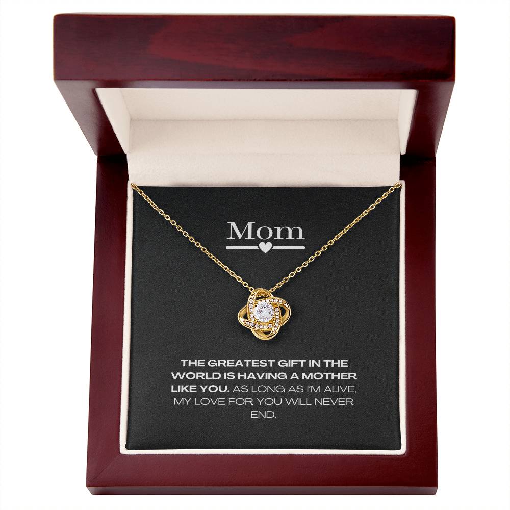 gold necklace with message in luxury box